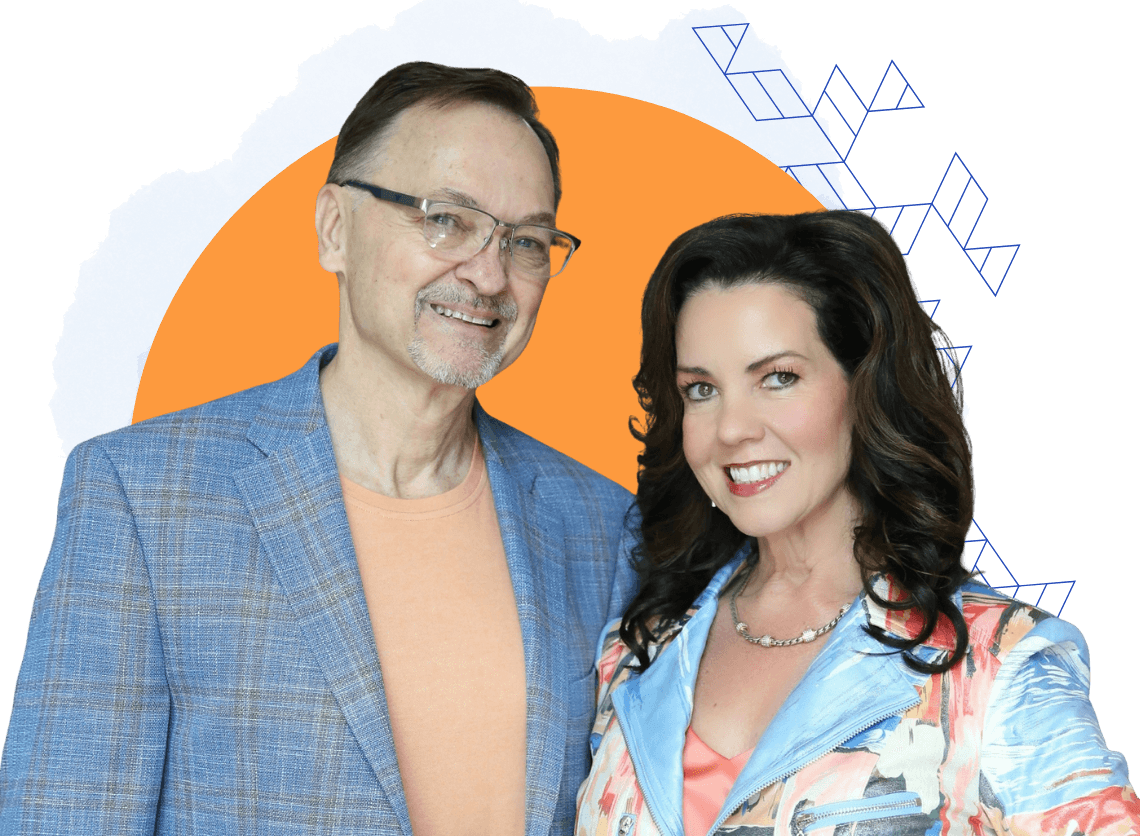 A man and a woman stand together smiling, dressed in patterned blazers, in front of an abstract orange and blue background, reflecting a confident consulting vibe.